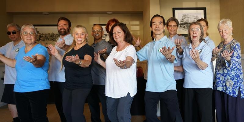 Group of people doing Tai Chi